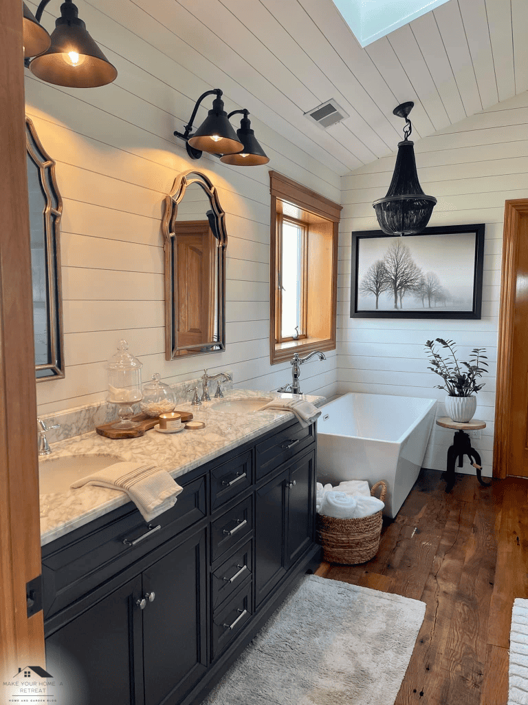 Luxurious Full Bath with wood flooring and two sinks