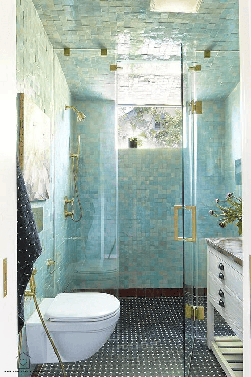 well lit glass tile contemporary bathroom.